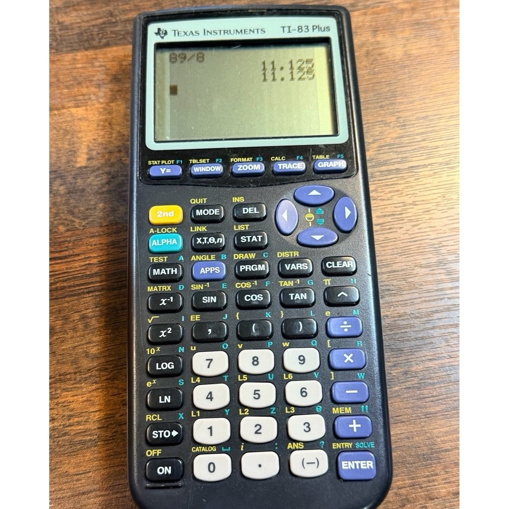 Texas Instruments TI-83 Plus graphing calculator with cover.  1999. Tested